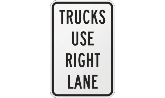 Trucks use right lane road sign